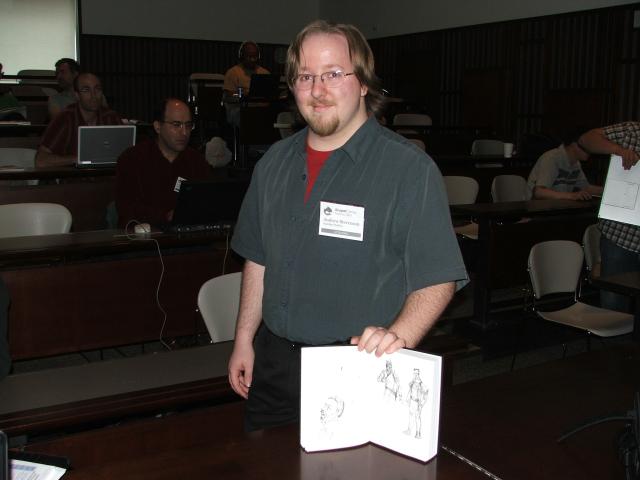 Andrew Stevenson with doodle notebook
